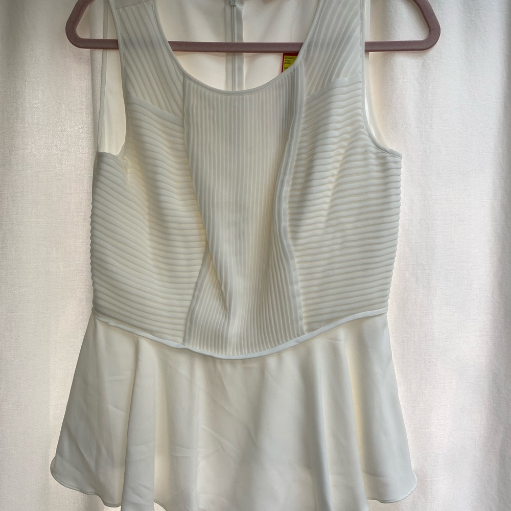Catherine Malandrino cream peplum top. NWT. Size 8